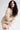 Organic Hoody - Sand on model with hand on thigh