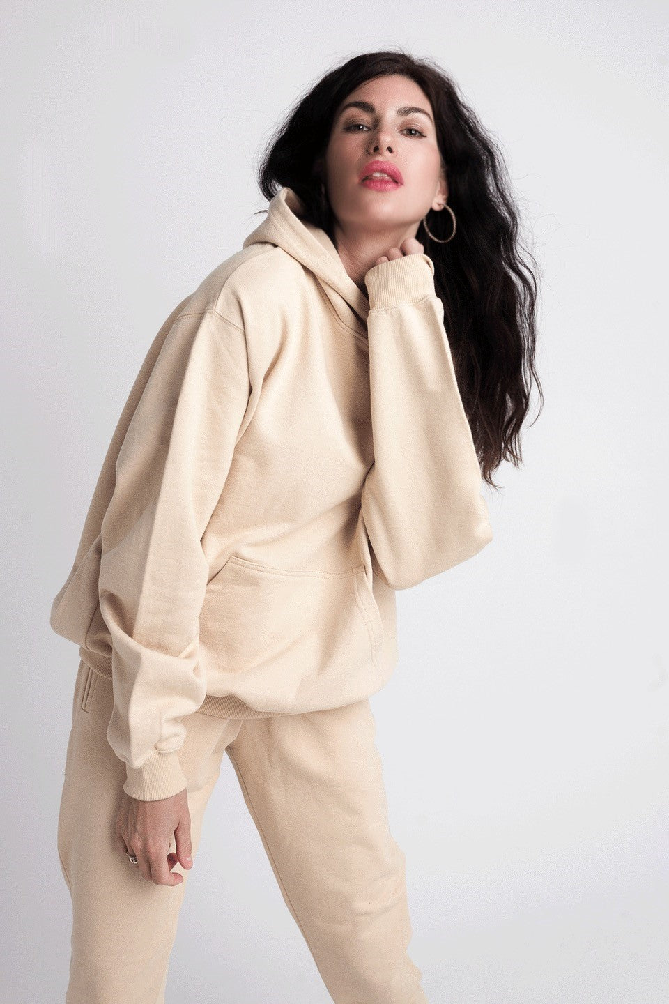 Organic Hoody - Sand on model with hand on neck
