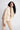 Organic Hoody - Sand on model with hand on neck